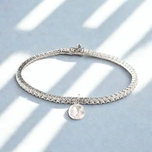 Bracciale tennis in argento rodiato con zirconi bianchi taglio diamante da 2.5 mm con medaglia di Padre Pio