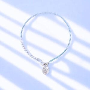 Bracciale Tennis in argento 925 rodiato con Micro Zirconi Celesti e medaglia Pade Pio