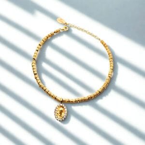 Bracciale con pepite e medaglia PADRE PIO in argento 925 giallo con zirconi bianchi.